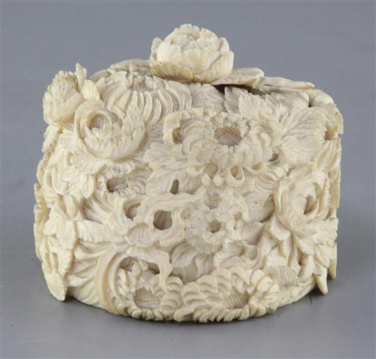 A Japanese thousand flower ivory box and cover, early 20th century, height 10cm, faults